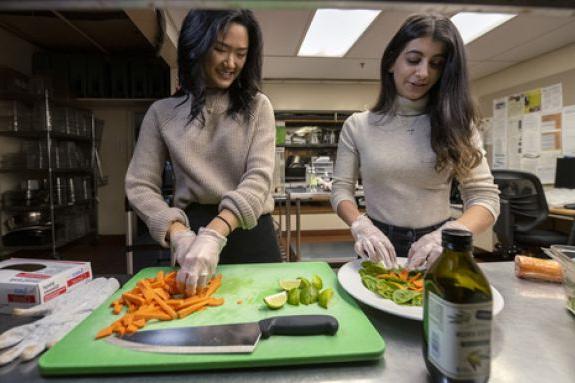 students preparing food